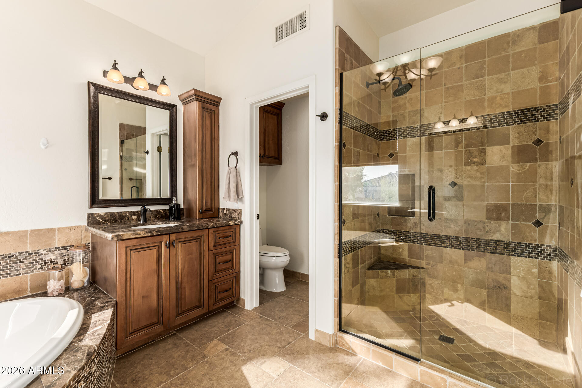 9719 East Pine Valley Road Scottsdale, AZ 85260 - Photo 34 of 62 a bathroom with a granite countertop sink mirror and shower