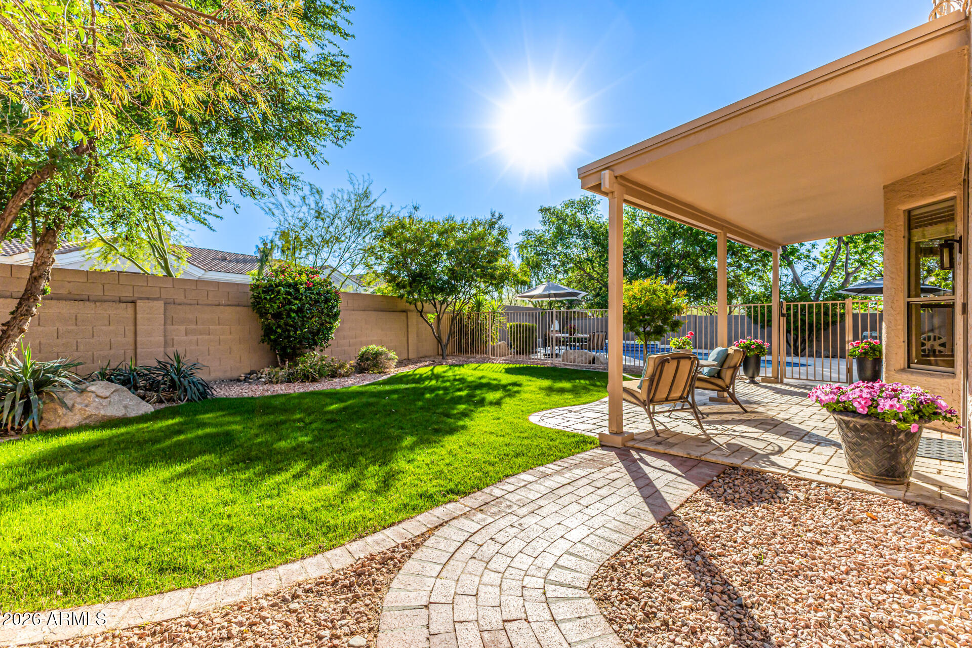 9719 East Pine Valley Road Scottsdale, AZ 85260 - Photo 53 of 62 a view of a backyard with sitting area