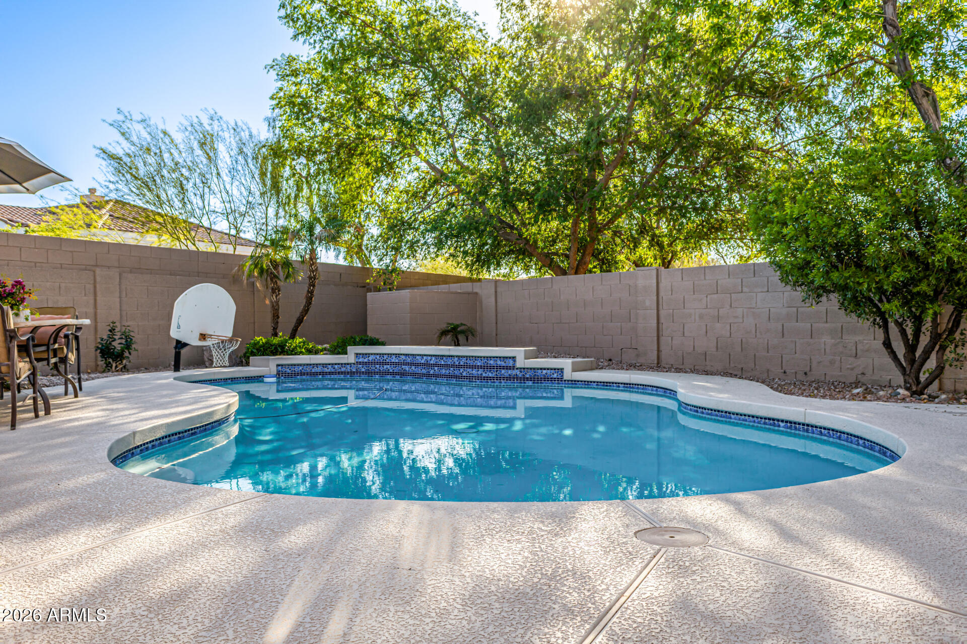 9719 East Pine Valley Road Scottsdale, AZ 85260 - Photo 56 of 62 a view of outdoor space yard deck and swimming pool
