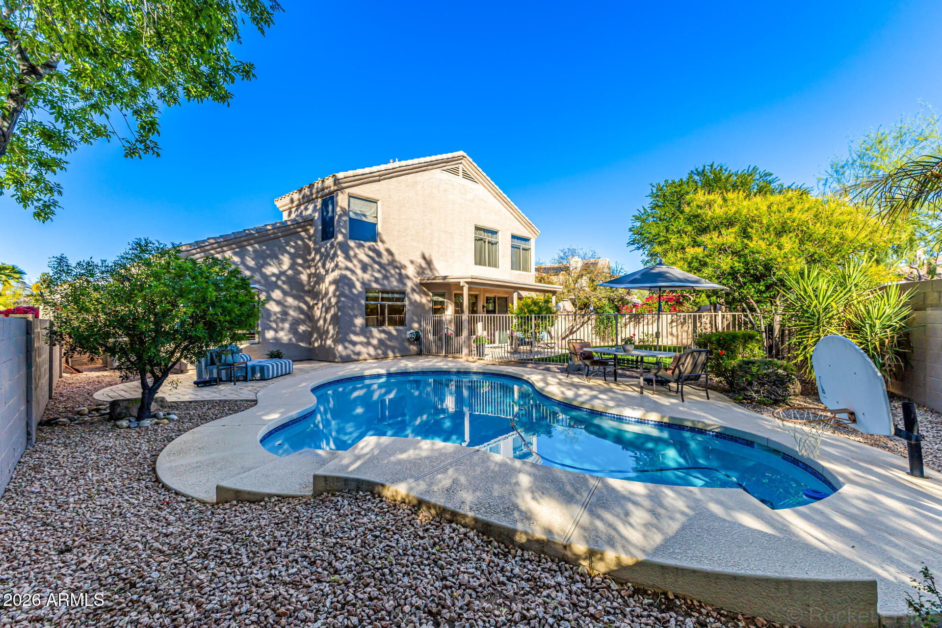 9719 East Pine Valley Road Scottsdale, AZ 85260 - Photo 60 of 62 a view of a house with entertaining space