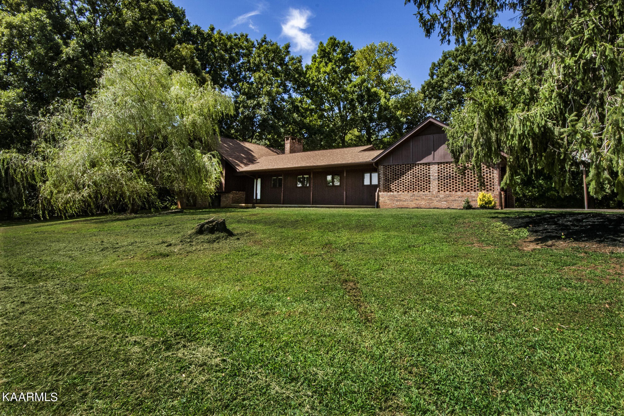 431 Sunnyside Road Sweetwater, TN 37874 - Photo 1 of 47 a view of a house with a backyard