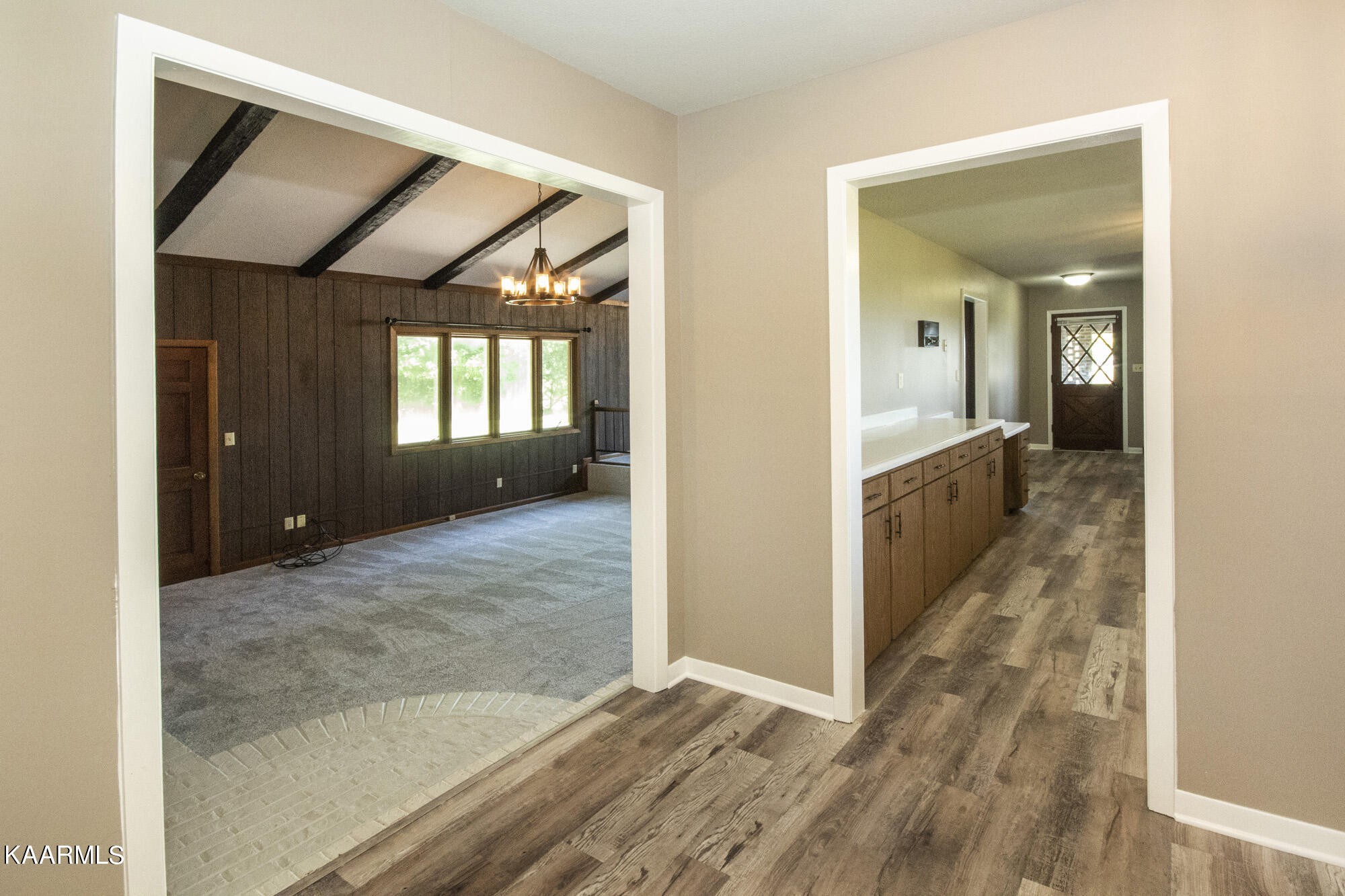 431 Sunnyside Road Sweetwater, TN 37874 - Photo 12 of 47 hallway with wooden floor and windows