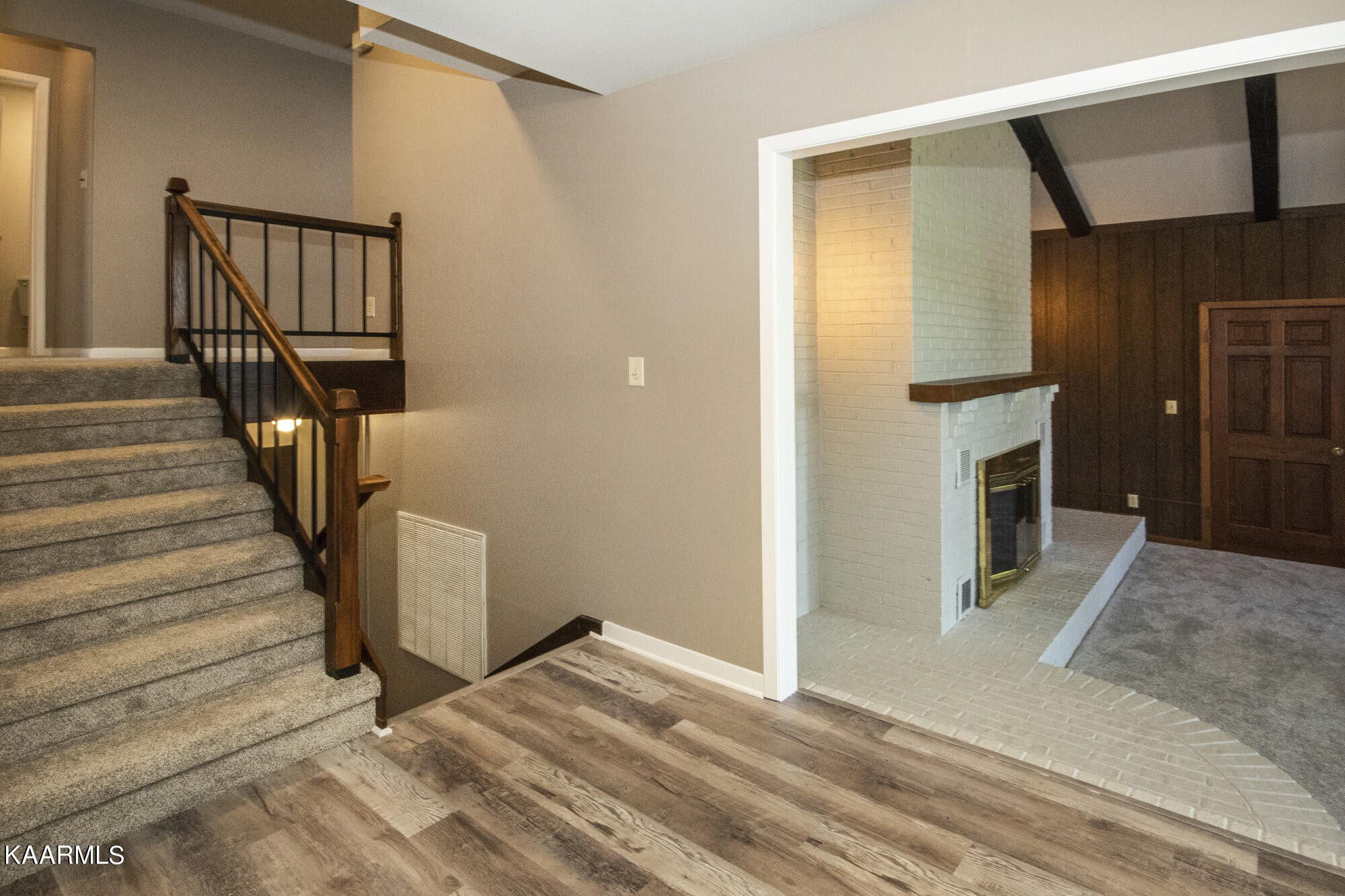 431 Sunnyside Road Sweetwater, TN 37874 - Photo 13 of 47 a view of a livingroom with wooden floor and staircase