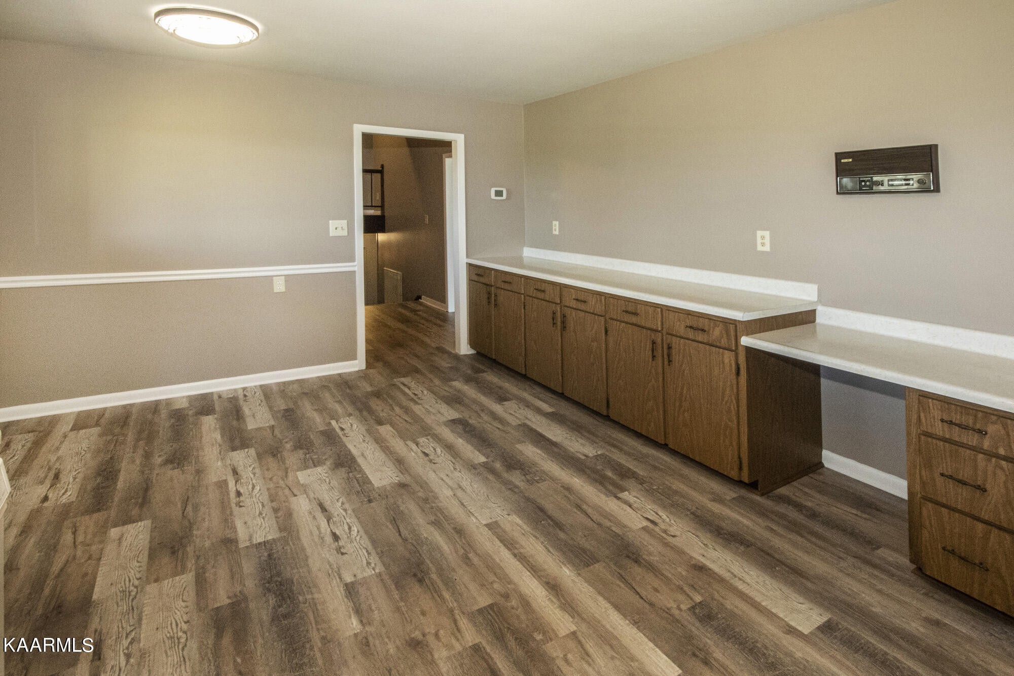 431 Sunnyside Road Sweetwater, TN 37874 - Photo 18 of 47 a view of an empty room with wooden floor