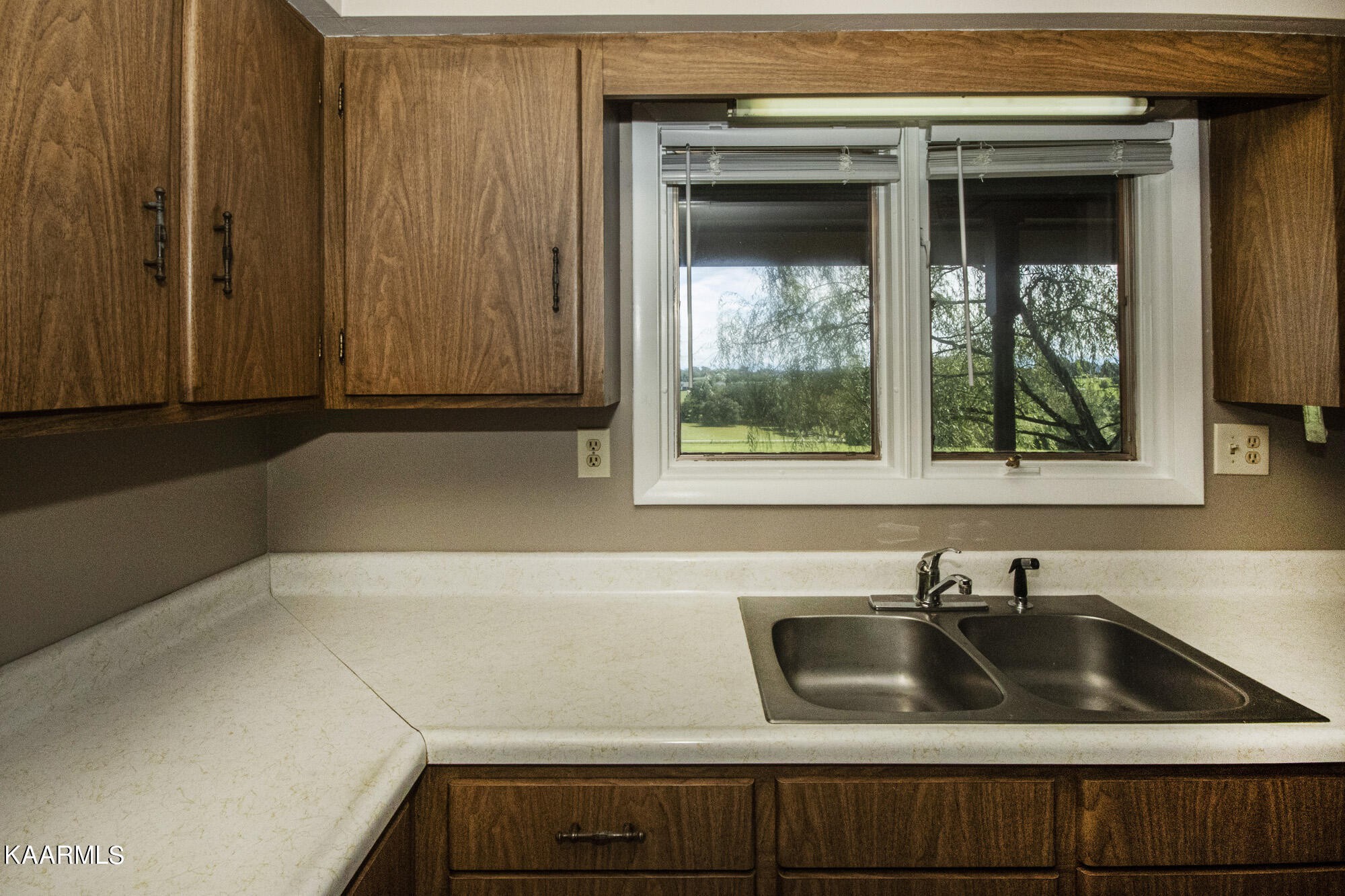 431 Sunnyside Road Sweetwater, TN 37874 - Photo 19 of 47 a bathroom with a sink and a window