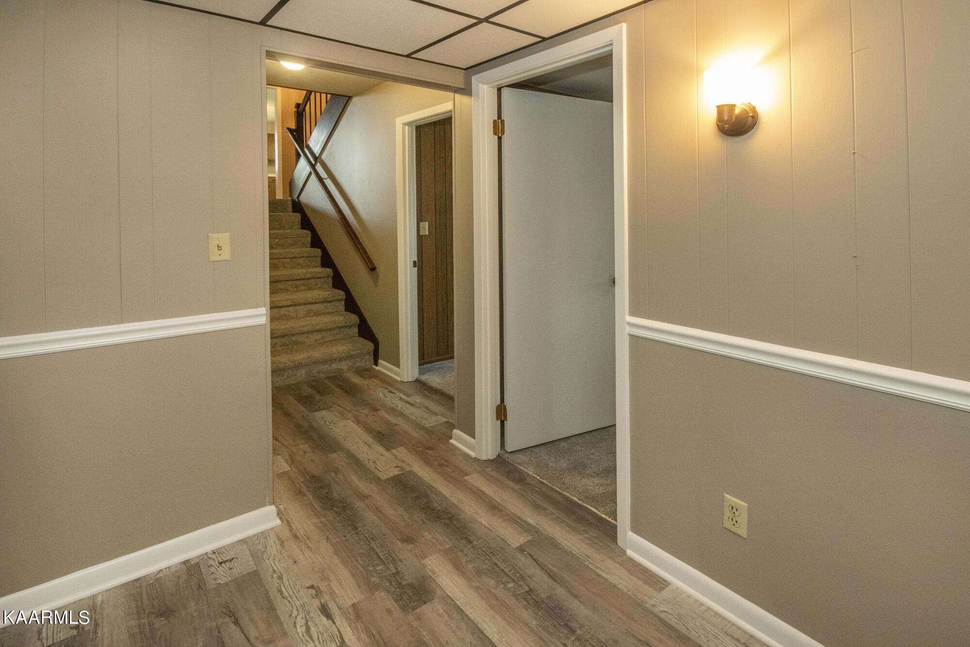 431 Sunnyside Road Sweetwater, TN 37874 - Photo 26 of 47 a view of a hallway with wooden floor and staircase