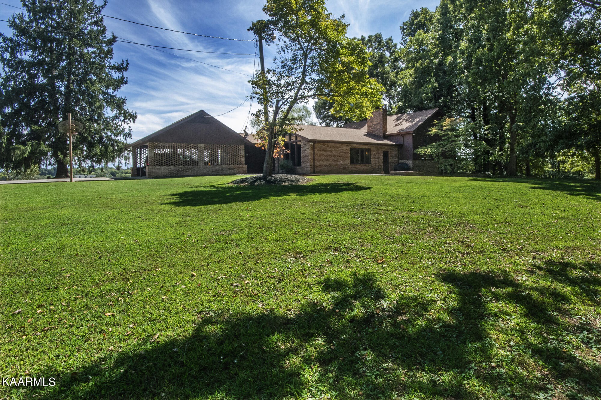 431 Sunnyside Road Sweetwater, TN 37874 - Photo 3 of 47 a front view of a house with garden