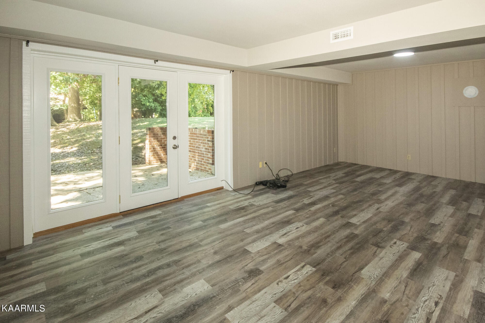 431 Sunnyside Road Sweetwater, TN 37874 - Photo 33 of 47 a view of empty room with wooden floor and fan