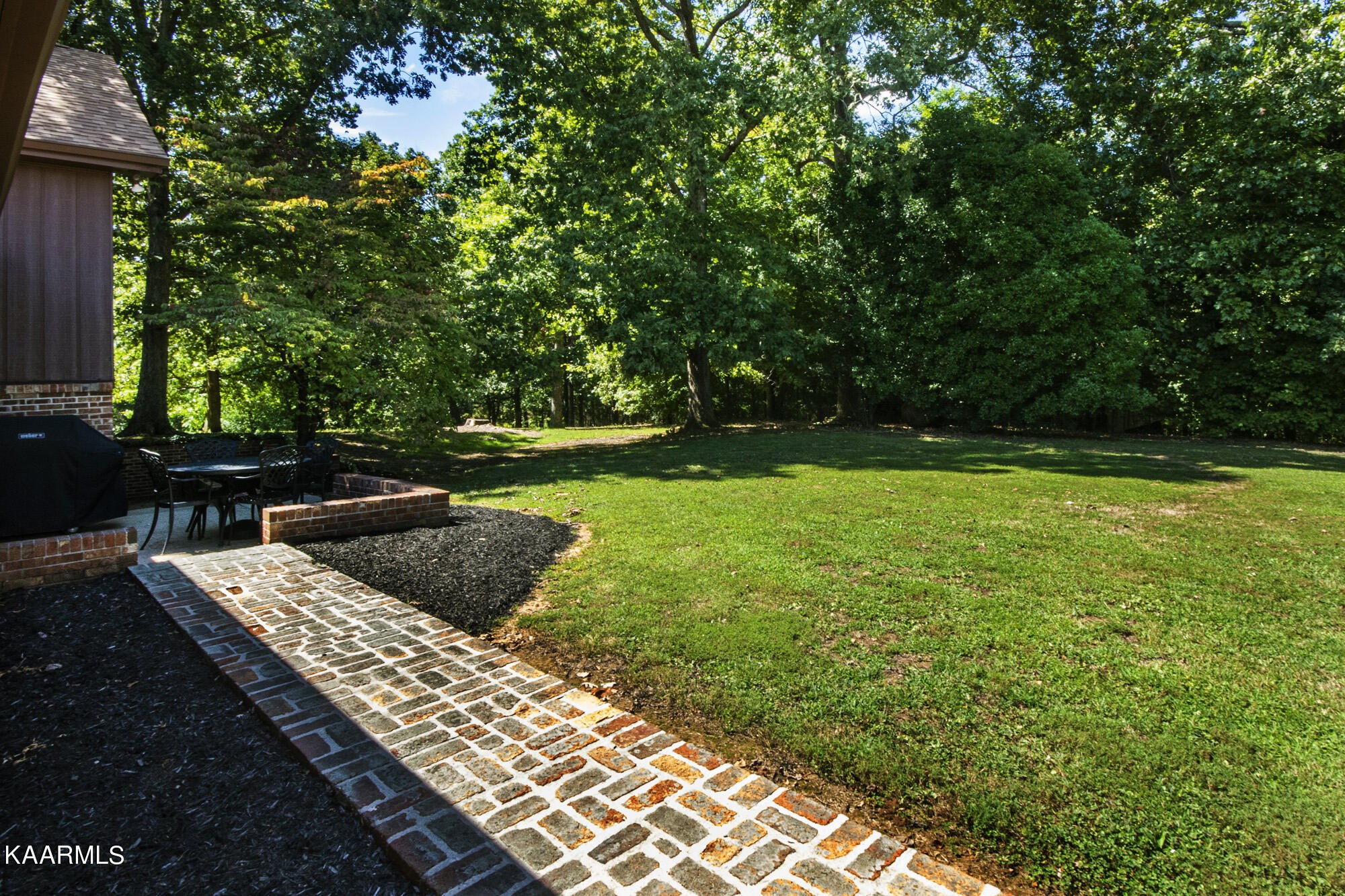 431 Sunnyside Road Sweetwater, TN 37874 - Photo 6 of 47 a view of a backyard with sitting area