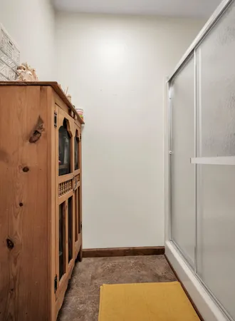 a view of a refrigerator in kitchen