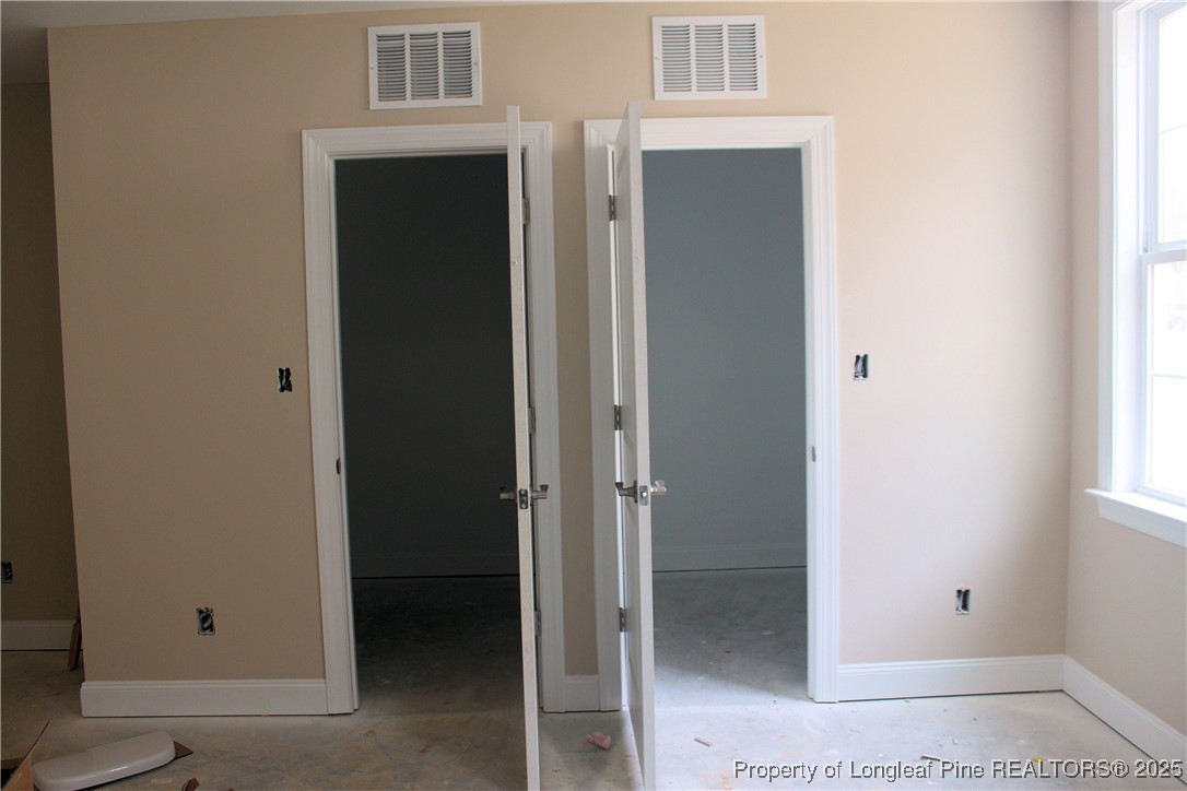 261 River Falls Road Sanford, NC 27332 - Photo 14 of 19 His and Her Closets