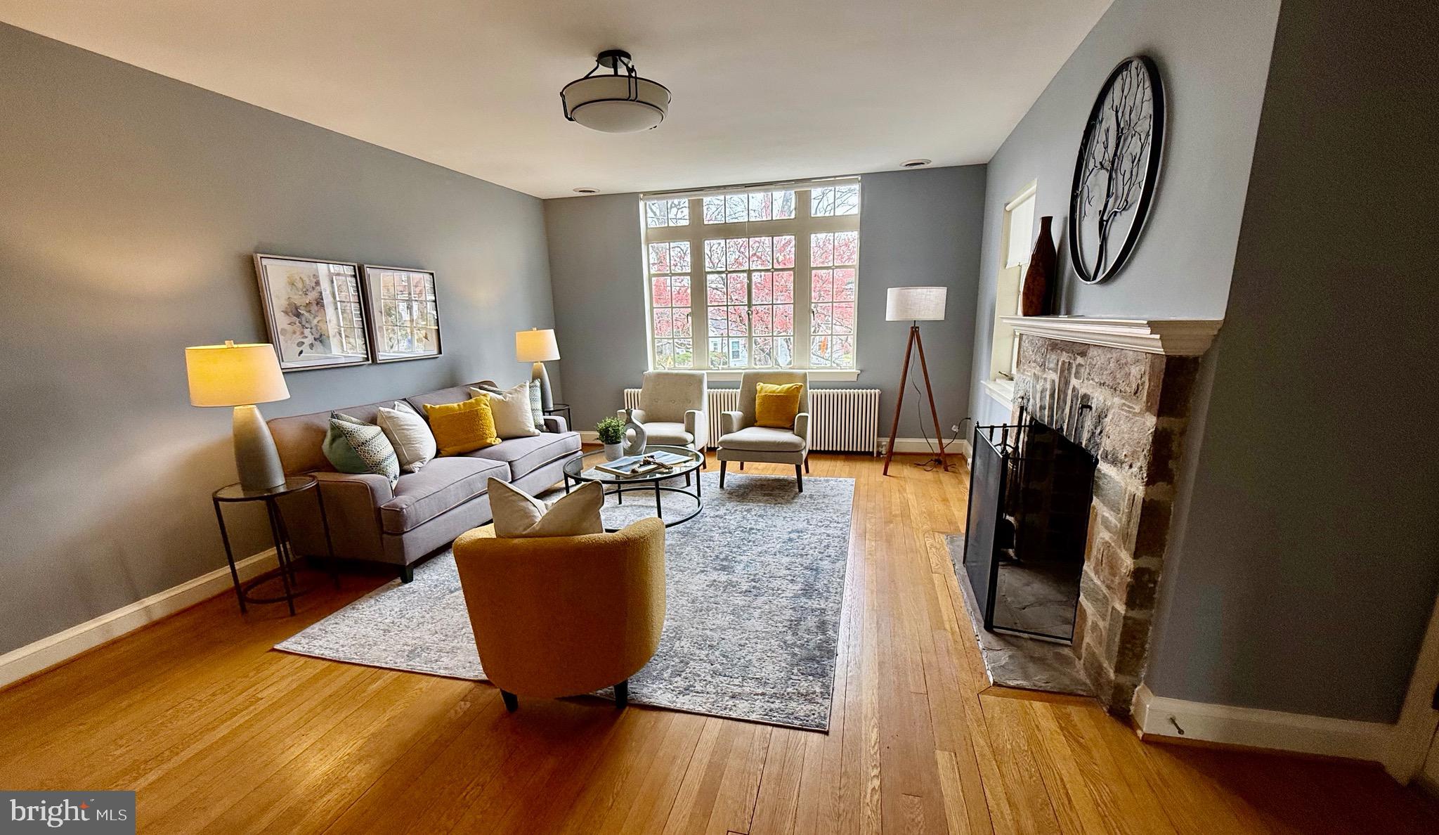 402 Dale Drive Silver Spring, MD 20910 - Photo 4 of 27 a living room with furniture and a fireplace