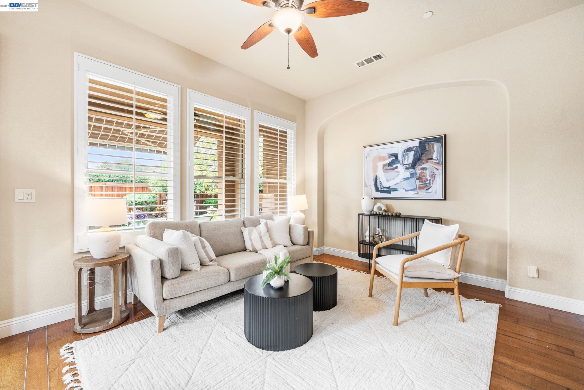 1033 Malbec Lane Brentwood, CA 94513 - Photo 17 of 37 a living room with furniture and a large window