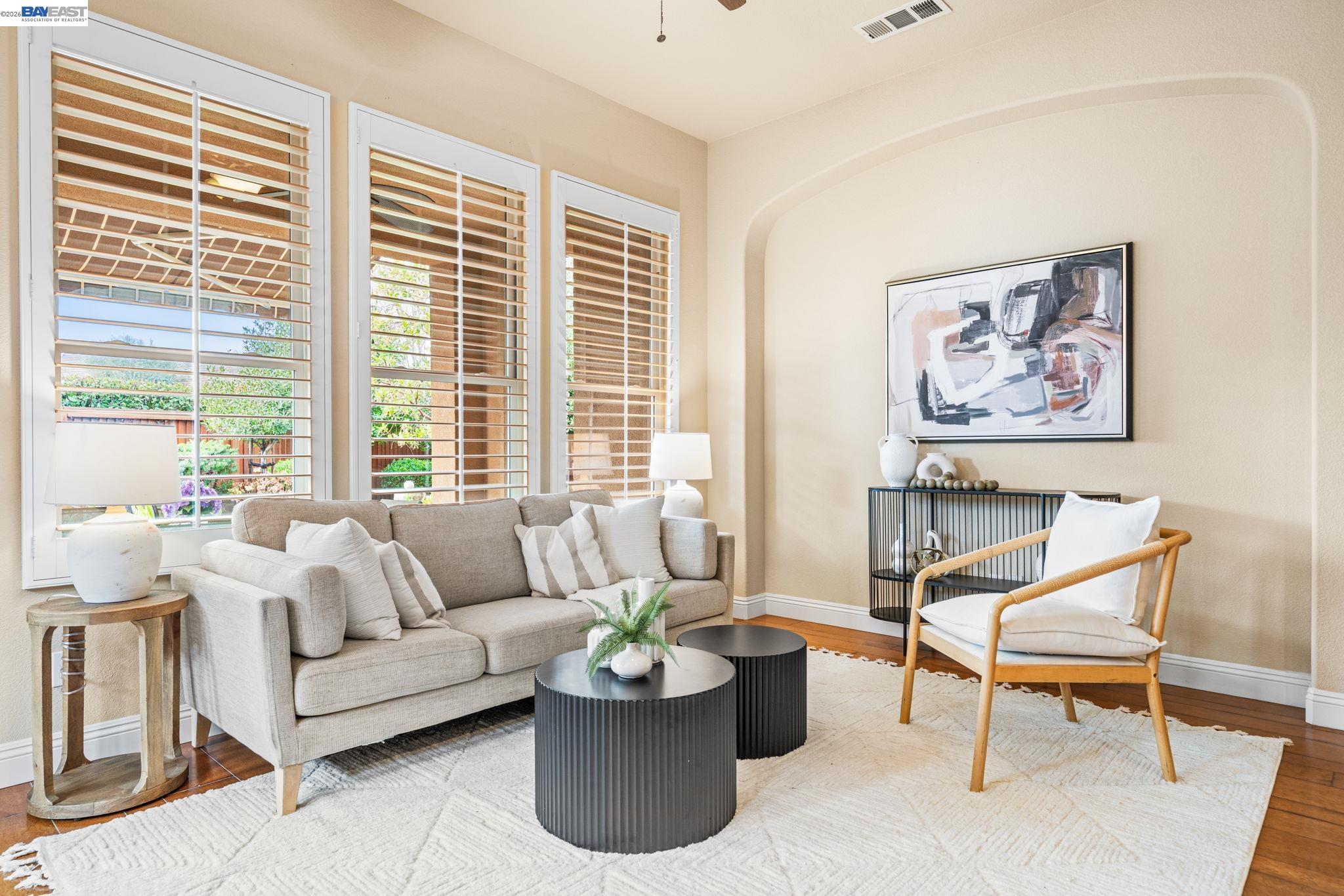 1033 Malbec Lane Brentwood, CA 94513 - Photo 18 of 37 a living room with furniture and a large window