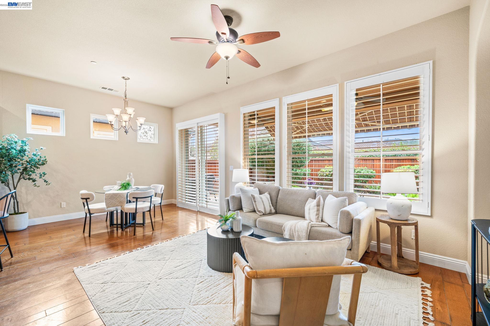 1033 Malbec Lane Brentwood, CA 94513 - Photo 19 of 37 a living room with furniture and a large window