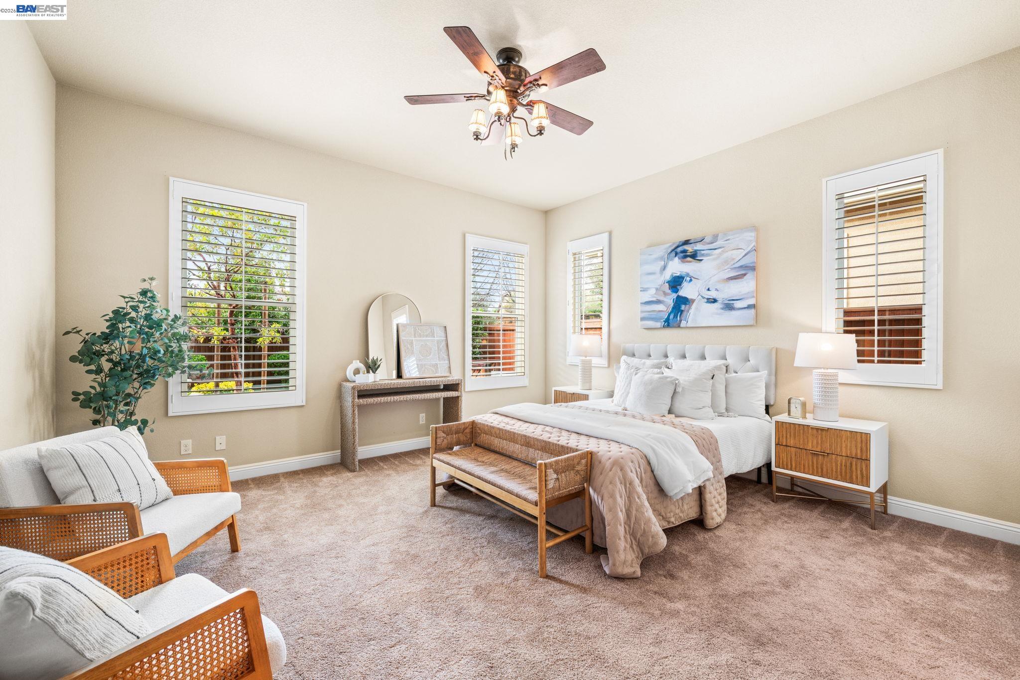 1033 Malbec Lane Brentwood, CA 94513 - Photo 22 of 37 a bed room with a bed and a chair