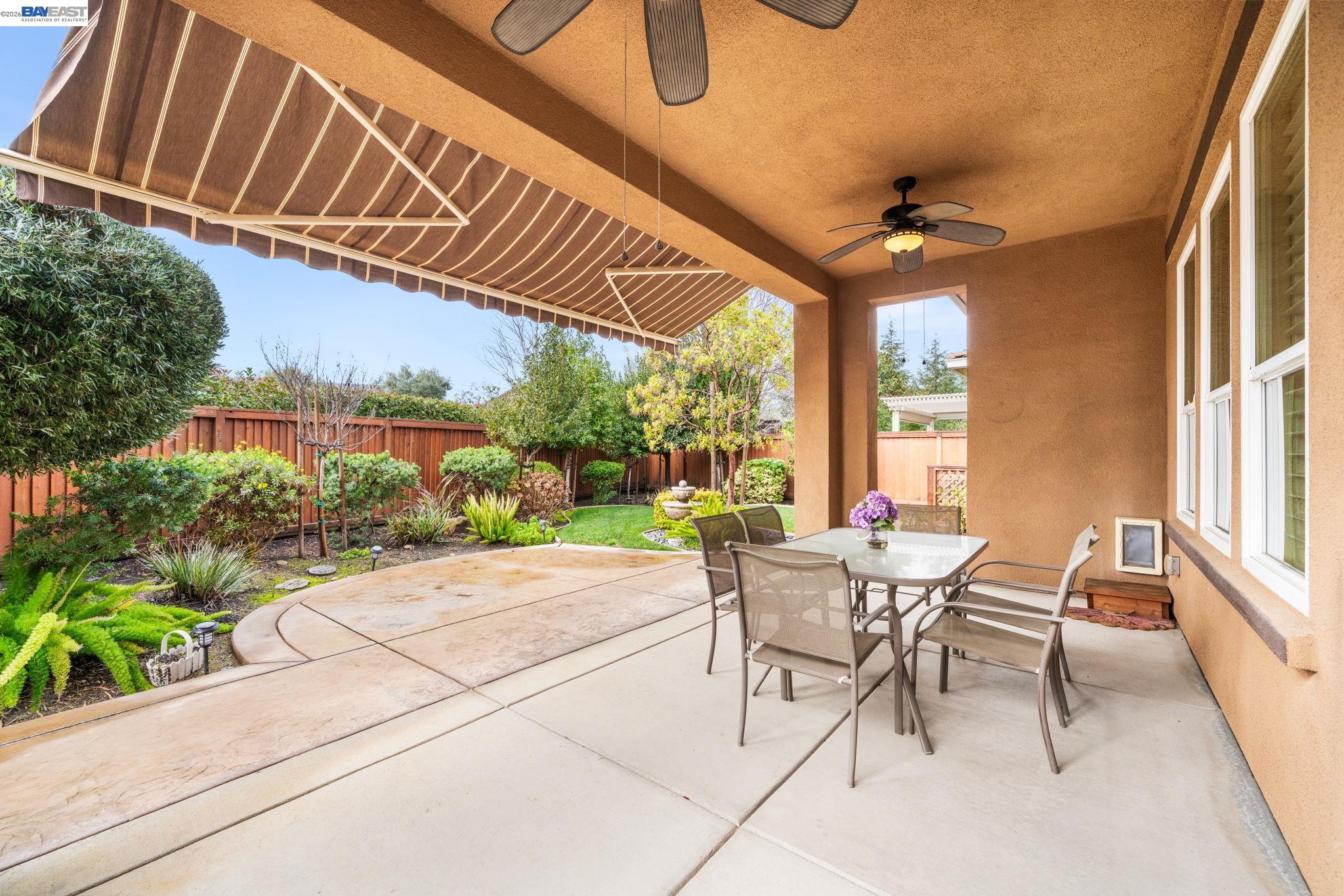 1033 Malbec Lane Brentwood, CA 94513 - Photo 29 of 37 a outdoor space with patio the table and chairs