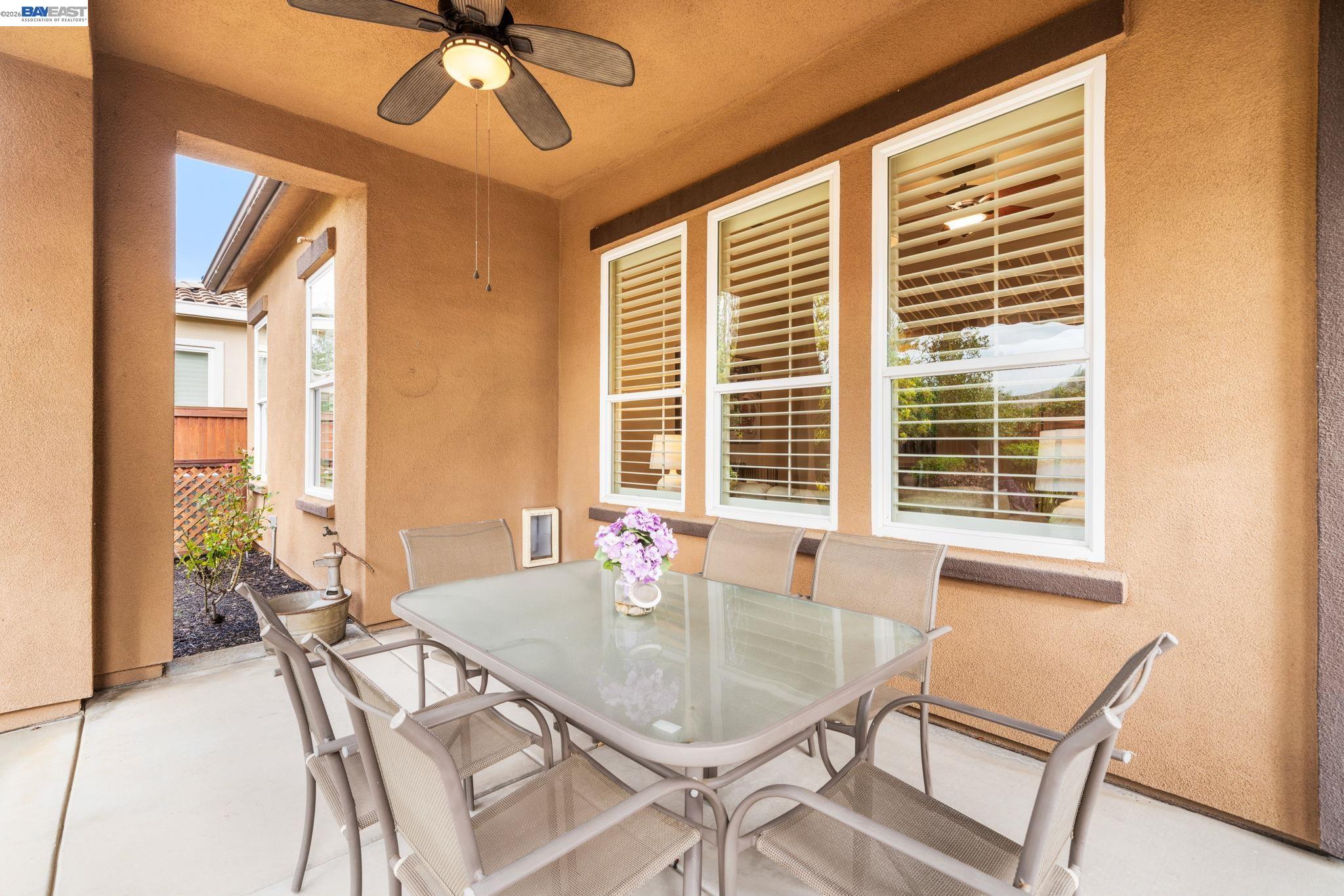 1033 Malbec Lane Brentwood, CA 94513 - Photo 30 of 37 a dining room with furniture and window