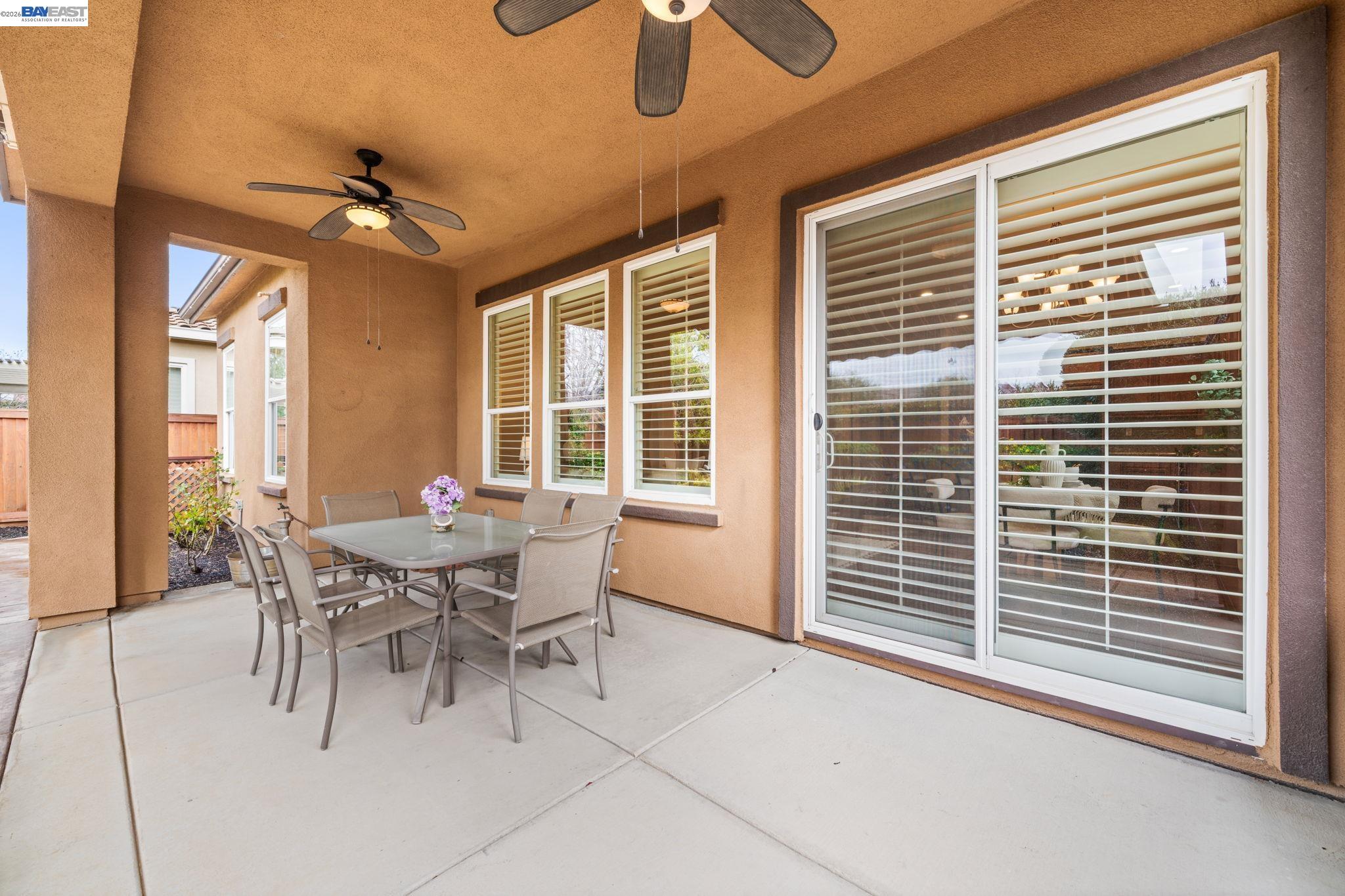 1033 Malbec Lane Brentwood, CA 94513 - Photo 31 of 37 a dining room with furniture and window