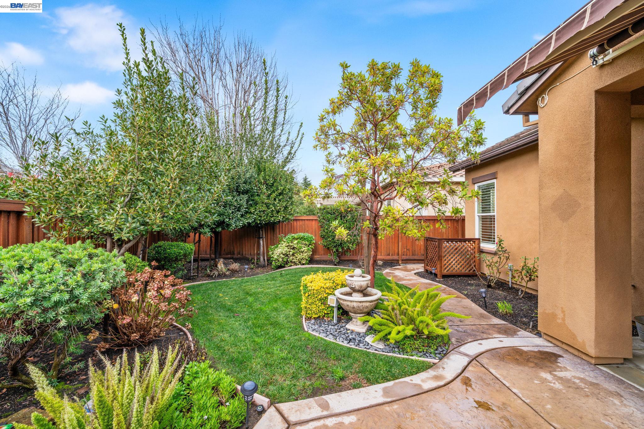 1033 Malbec Lane Brentwood, CA 94513 - Photo 36 of 37 a view of a backyard with chair and tables