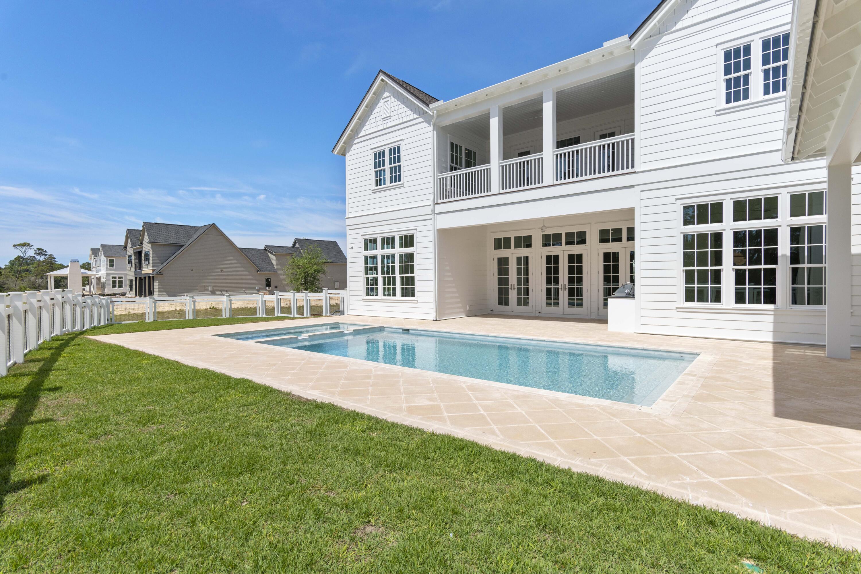 130 East Elliot Way Watersound, FL 32461 - Photo 18 of 52 a front view of a house with a yard