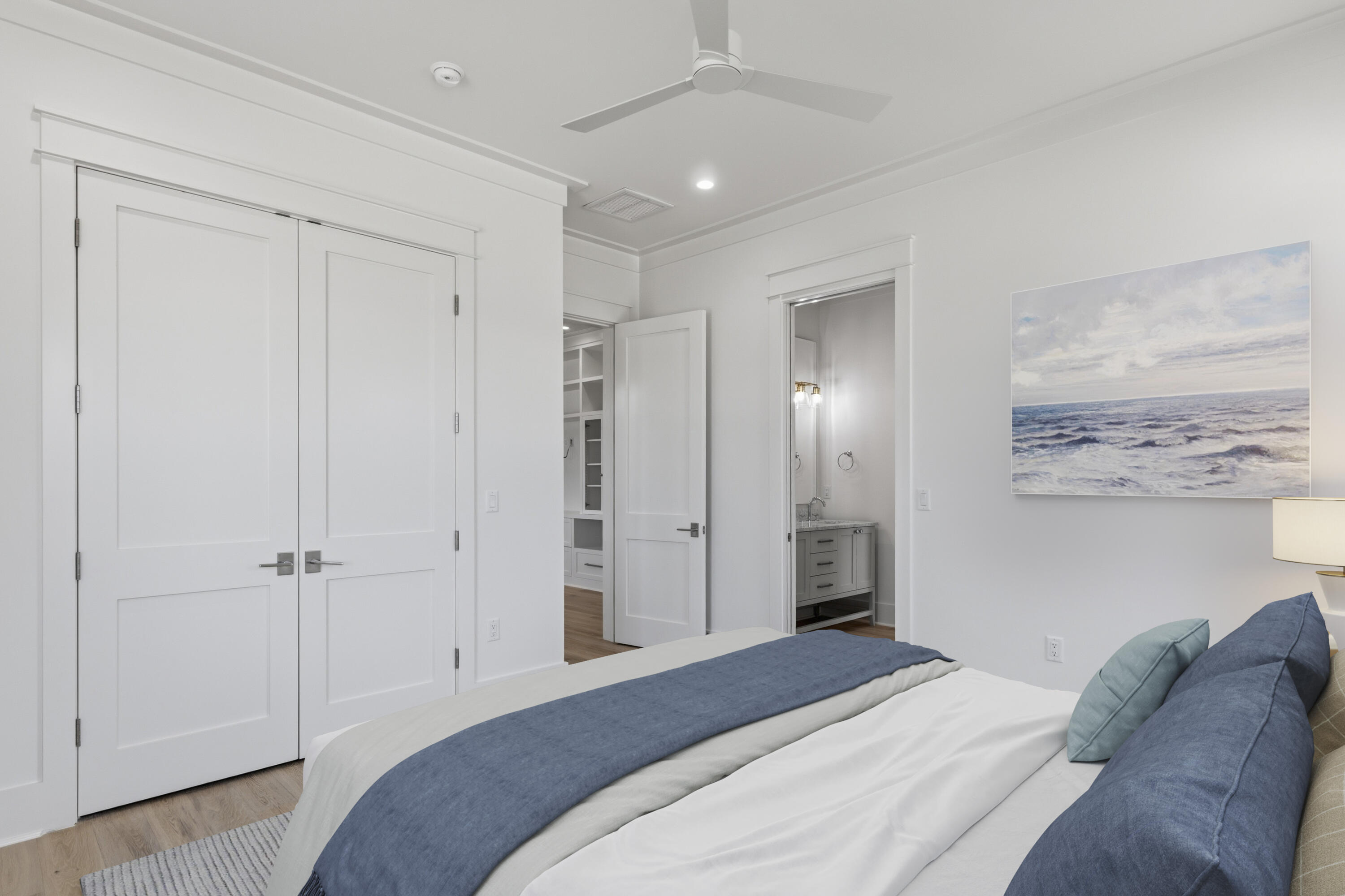 130 East Elliot Way Watersound, FL 32461 - Photo 42 of 52 a bedroom with a bed and a chandelier