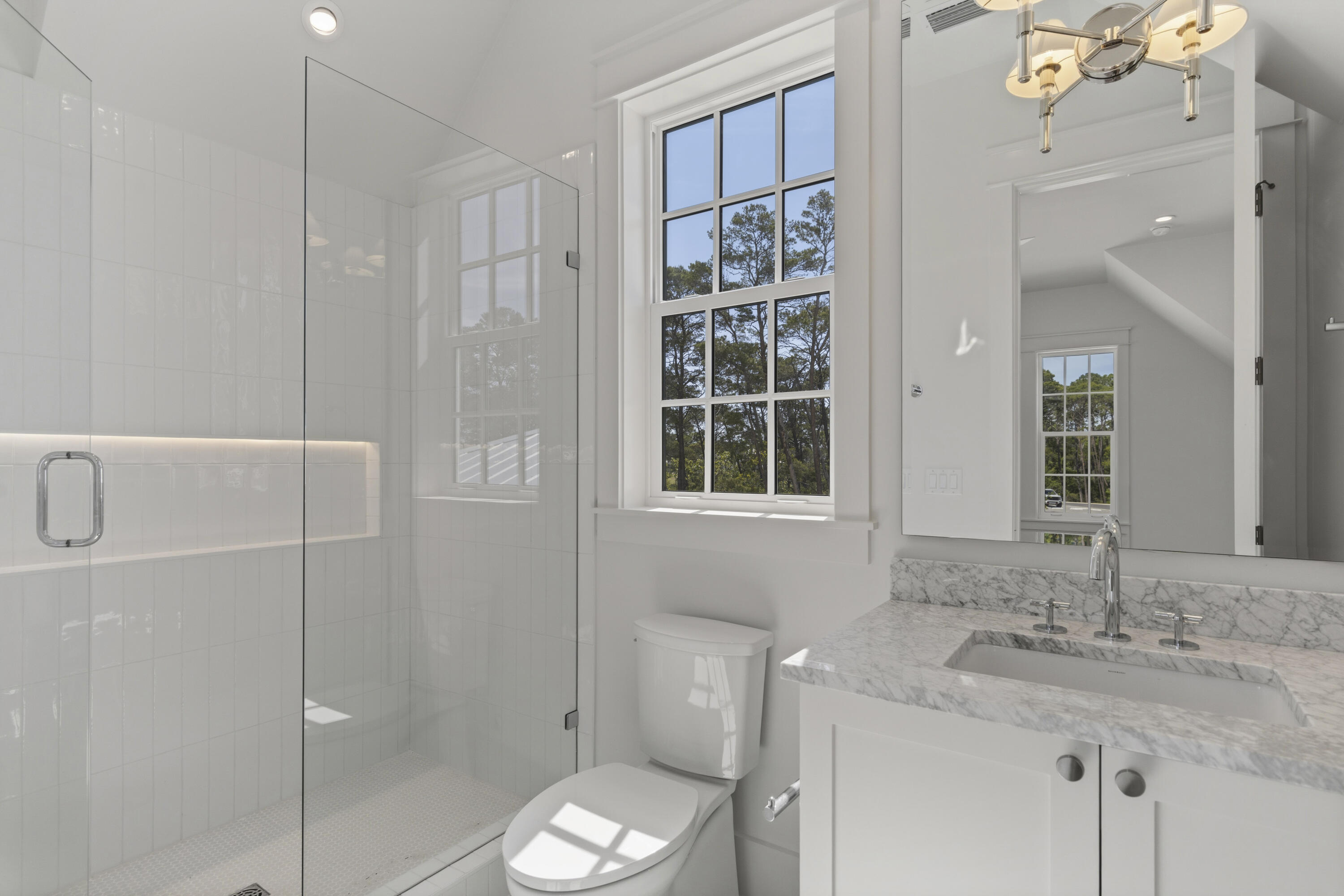 130 East Elliot Way Watersound, FL 32461 - Photo 47 of 52 a bathroom with a granite countertop sink a toilet and shower