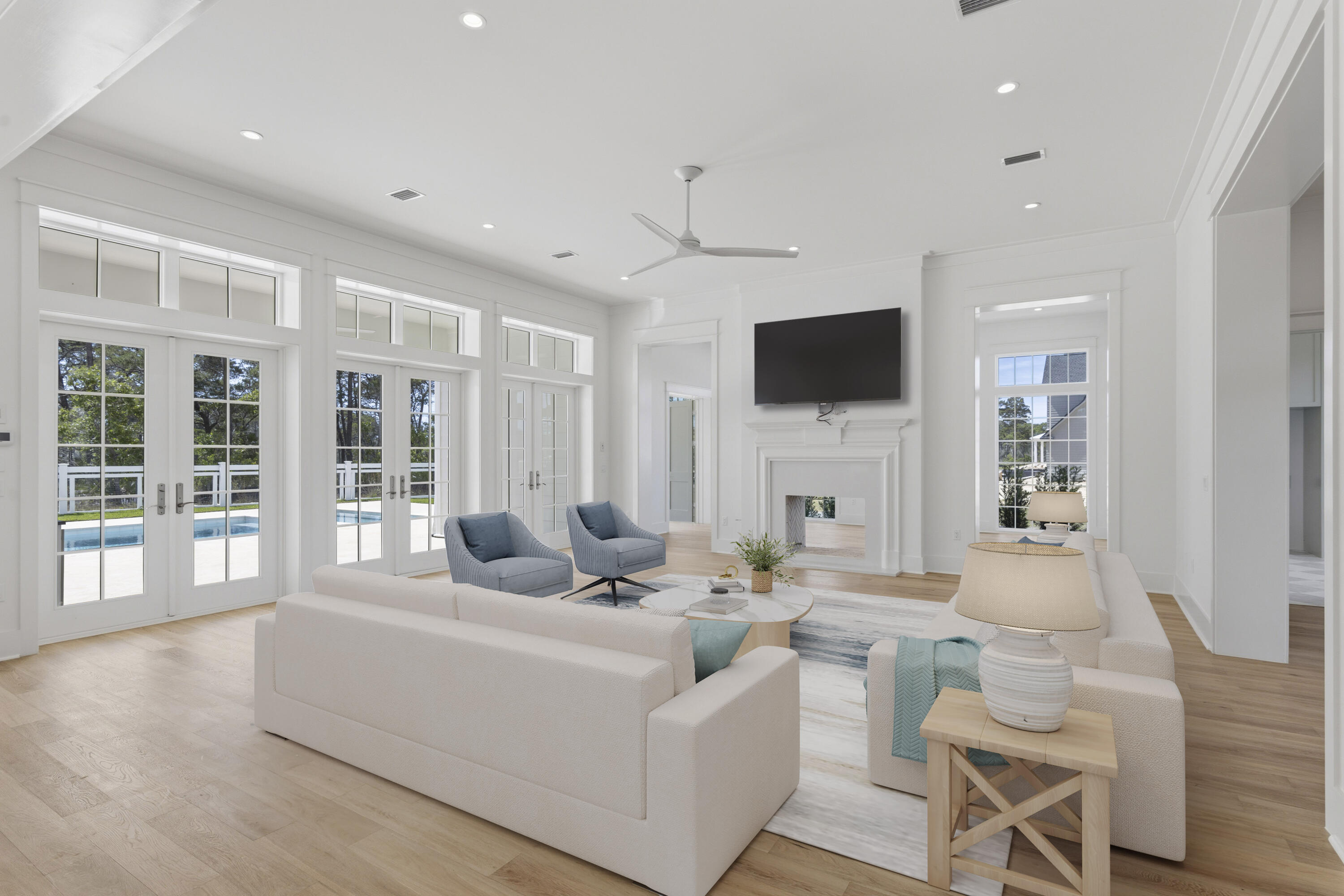 130 East Elliot Way Watersound, FL 32461 - Photo 7 of 52 a living room with fireplace furniture and a flat screen tv
