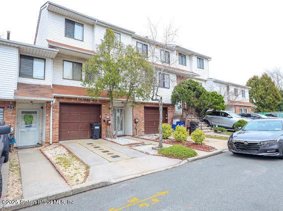 a view of a car park in front of a building