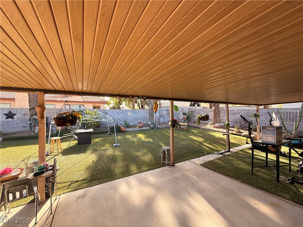 6425 West Eagle Point Road Las Vegas, NV 89108 - Photo 42 of 42 Fenced backyard featuring a patio