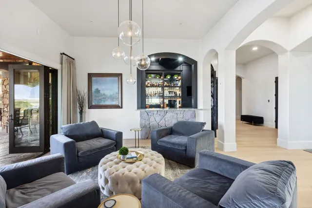 a kitchen with a refrigerator and a stove