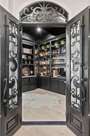 a kitchen with granite countertop a oven and a refrigerator