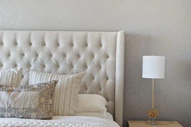 a bathroom with a sink a mirror and a shower