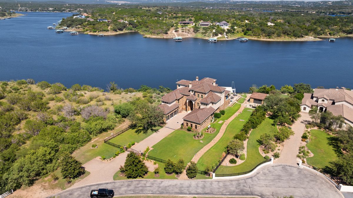 1216 Travis Bluff Way Spicewood, TX 78669 - Photo 2 of 38 view of a lake from a room