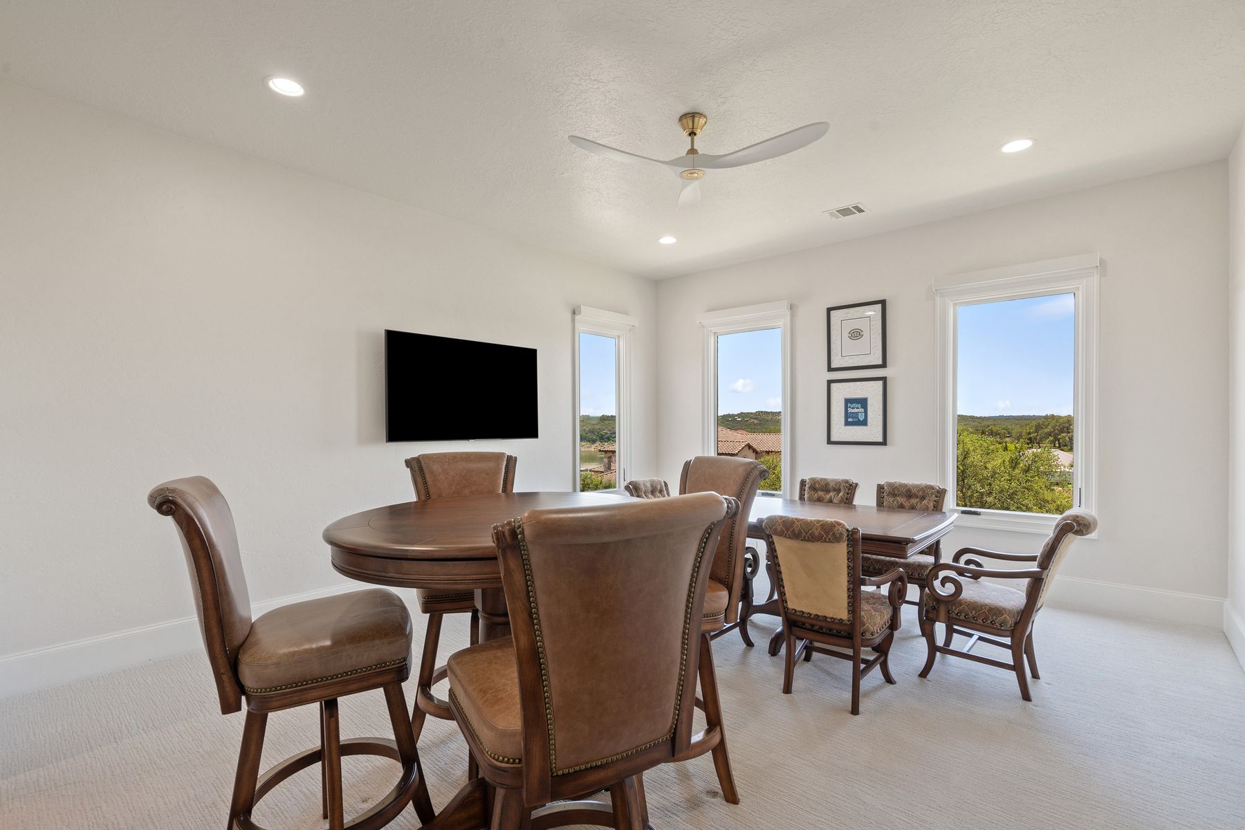 1216 Travis Bluff Way Spicewood, TX 78669 - Photo 29 of 38 a view of a dining room with furniture