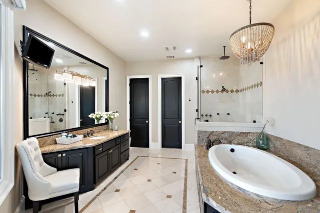 a living room with lots of furniture and a flat screen tv