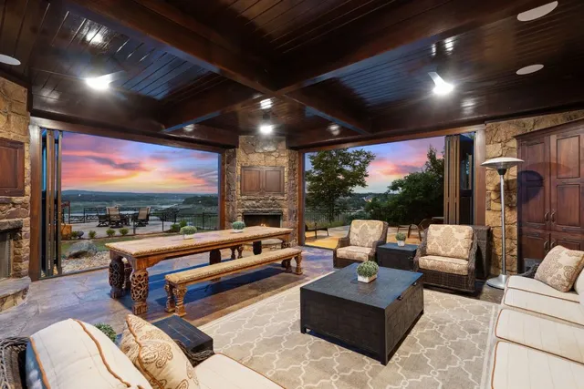 a view of a chairs and table in the patio