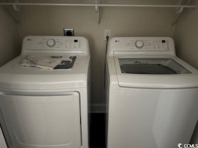 304 South Magnolia Avenue Andrews, SC 29510 - Photo 18 of 19 Laundry area featuring separate washer and dryer