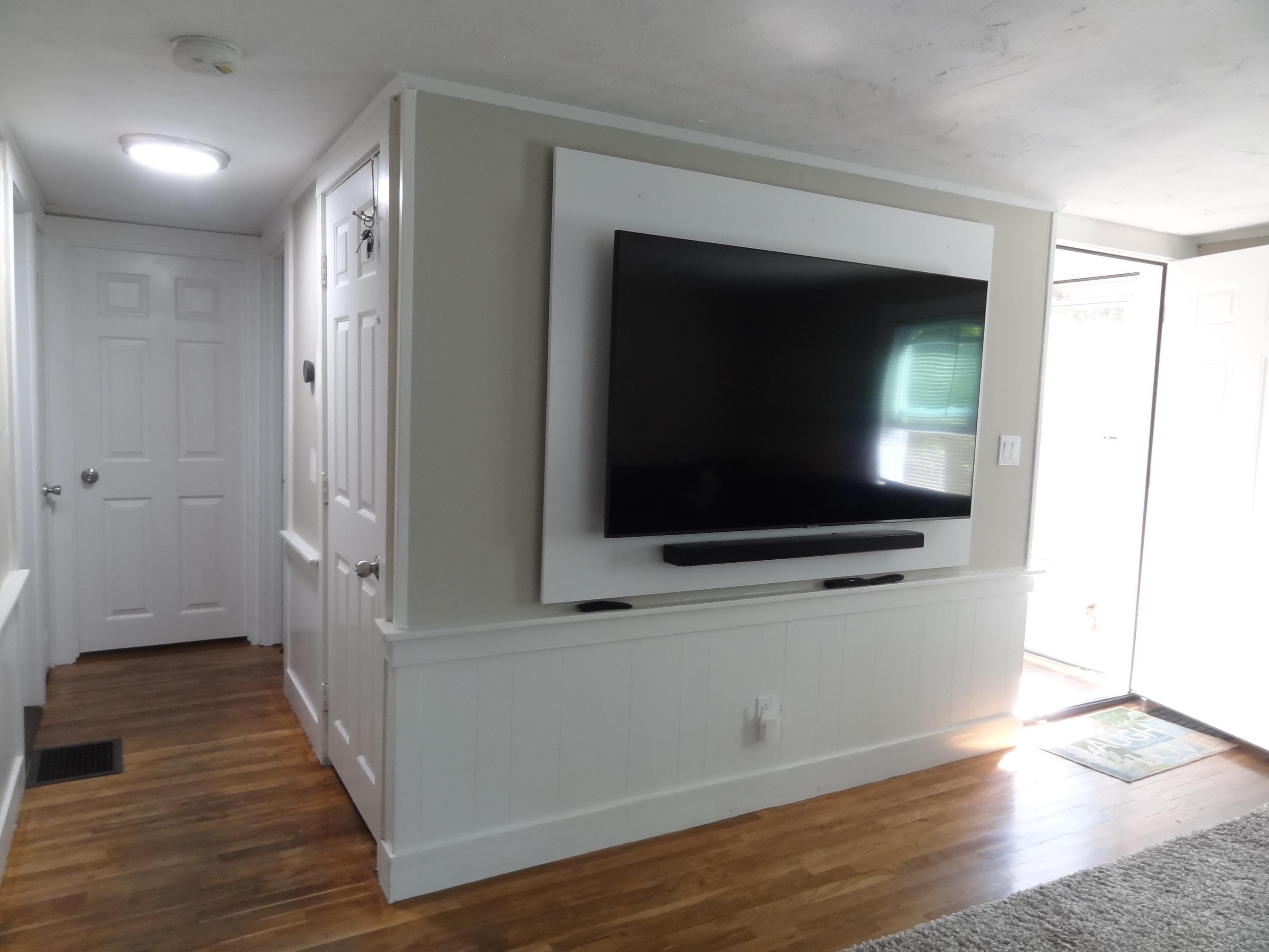 19 Brookshire Road Hyannis, MA 02601 - Photo 14 of 28 a view of a living room with a flat screen tv and wooden floor