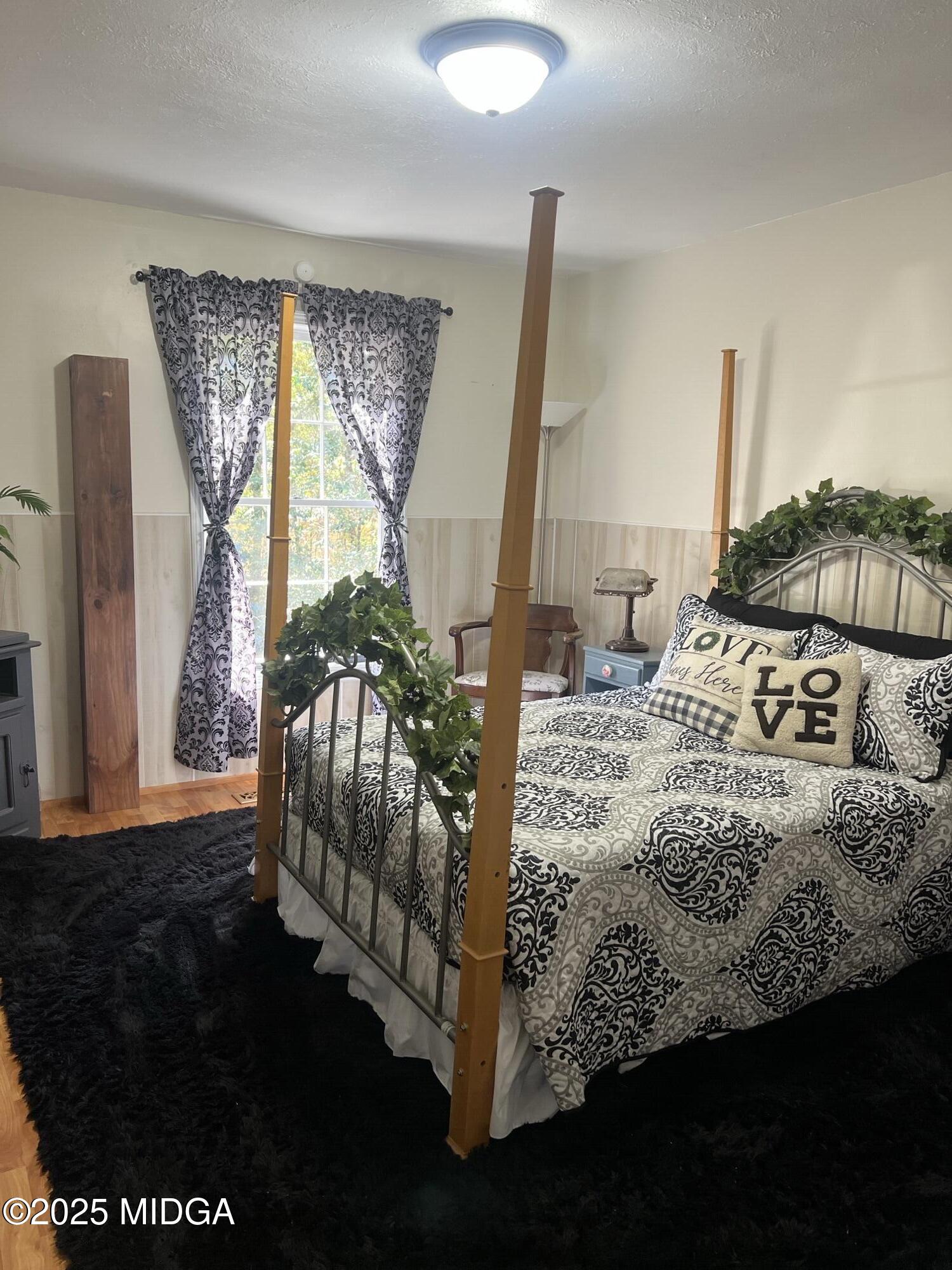 311 Overlook Drive Montezuma, GA 31063 - Photo 16 of 25 a bedroom with a bed and window