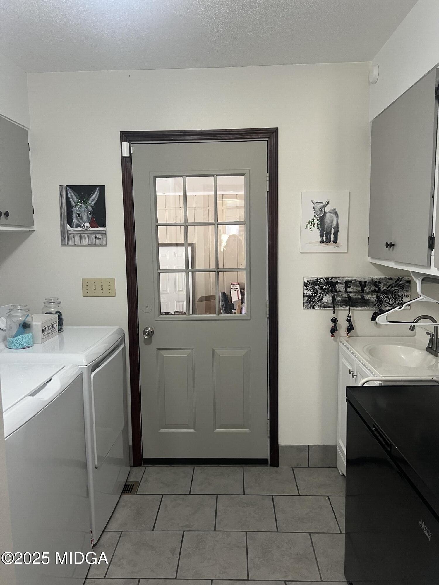 311 Overlook Drive Montezuma, GA 31063 - Photo 25 of 25 a room with a sink and a washer dryer