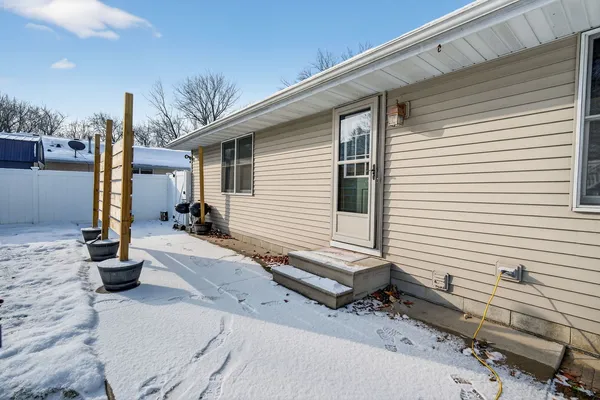 a view of a back yard of the house