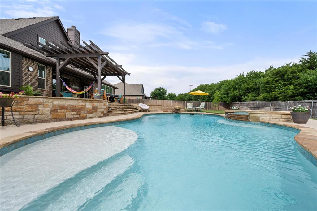 445 Rusty Run Drive Midlothian, TX 76065 - Photo 32 of 40 a view of swimming pool with a yard