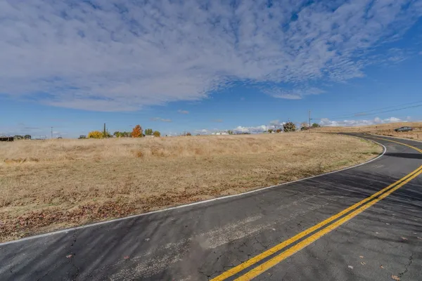 a view of beach and yard