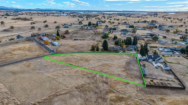 an aerial view of beach and ocean