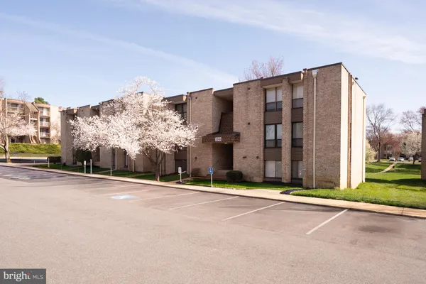 a view of a building with a street