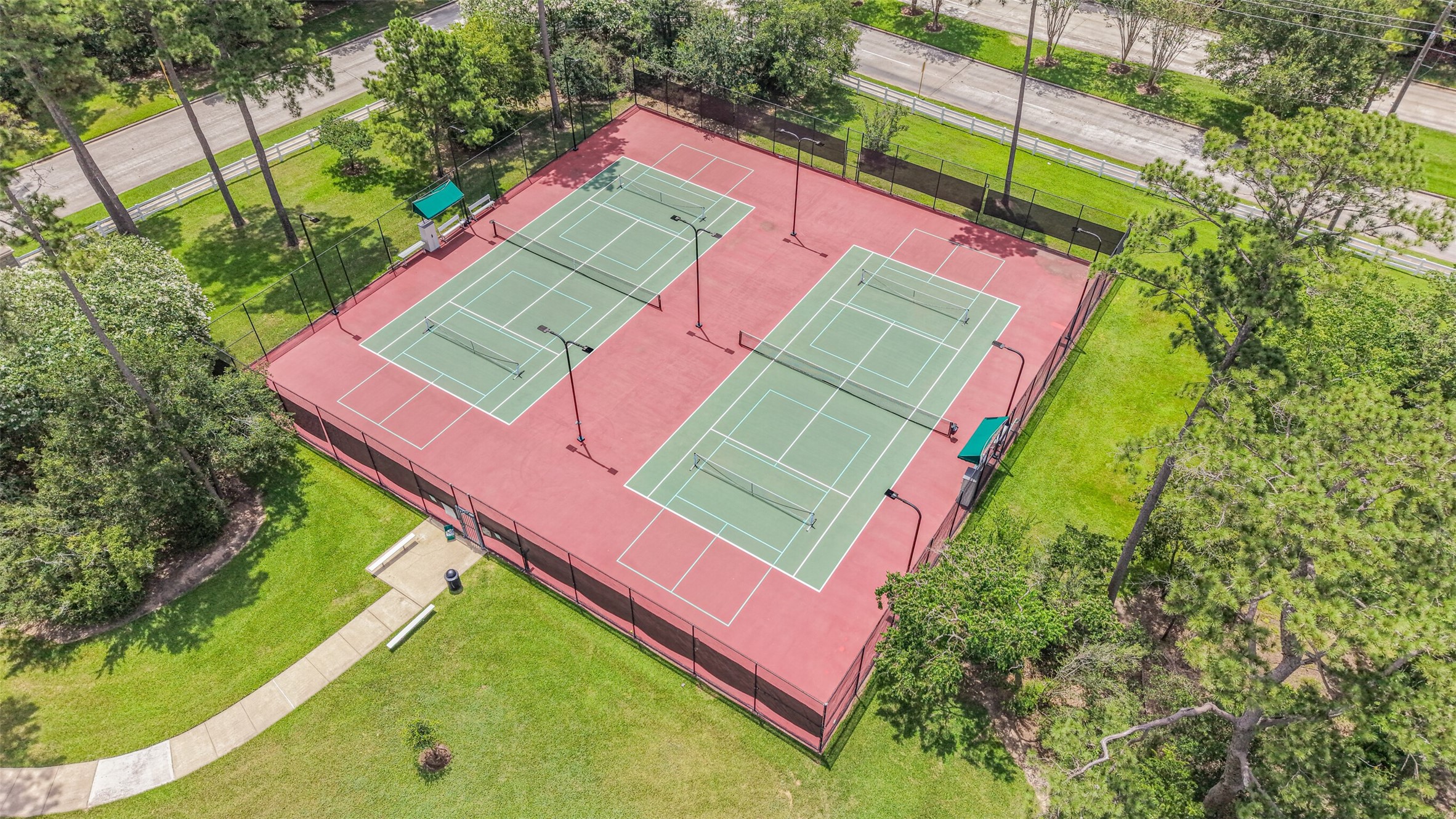 14919 Codys Run Cypress, TX 77429 - Photo 29 of 32 Tennis or pickleball? Whatever you choose, the courts are available for residents and located a few blocks from the house.