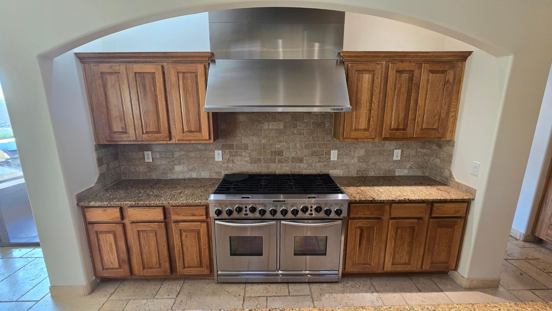4485 East Quail Brush Road Cave Creek, AZ 85331 - Photo 2 of 64 a stove top oven sitting inside of a kitchen