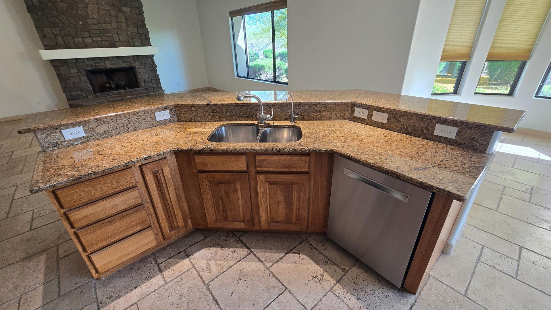 4485 East Quail Brush Road Cave Creek, AZ 85331 - Photo 25 of 64 a kitchen with a sink stove and cabinets
