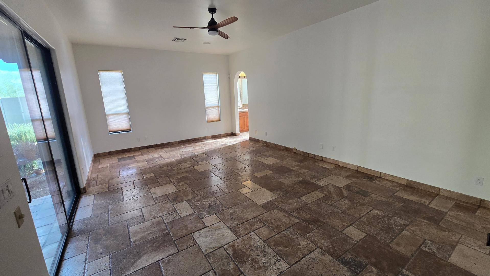 4485 East Quail Brush Road Cave Creek, AZ 85331 - Photo 30 of 64 an empty room with windows